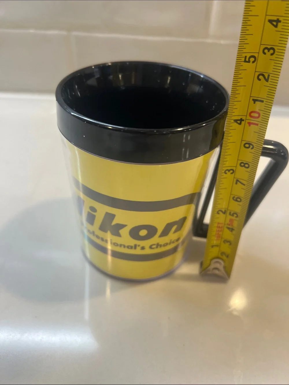 Vintage 70's Nikon thermal mug Camera-related